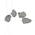 Four Gray Stones With Rough Surface Placed On White Background