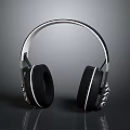 Modern Over Ear Headphones With Sleek Silver Headband And Black Cushions