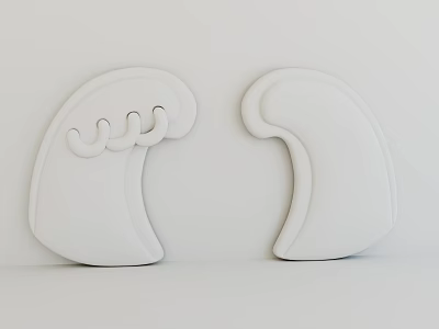 Two White Carved Sculptures With Wave Shaped Design And Curved Details 3d model