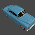Blue Vintage Car With Classic Design Rounded Body And White Wall Tires