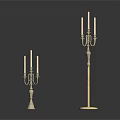 Elegant Golden Candelabras in Different Sizes with Candles on White Surface