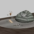 Cozy Living Area With Green Bean Bag Chair Round Rug Books And Wooden Floor