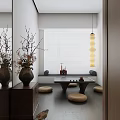 Minimalist Tea Room Interior With Low Table Cushions Vases And Hanging Lamp