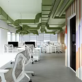 Modern Public Office Space with Open Layout Green Pipes Colorful Striped Walls and White Desks