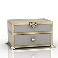 Ornamental Decor Set Featuring Golden Frame Gray Drawers Decorative Clasp and Elegant Pedestal Feet