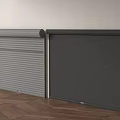Two Different Colored Roller Shutters Installed On White Wall With Wooden Floor