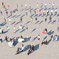 Many People Standing And Sitting In Spacious Open Outdoor Square Ground Area