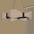 Modern Stylish Pendant Light With Perforated Shade And Black Frame Hanging In Room