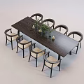 Dark Long Wooden Dining Table Set With Six Chairs Light Seats Green Plants And Candles