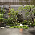 Indoor Landscape Design With Lush Green Plants Stone Feature And Pathway Lights