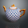 Elegant White Ceramic Teapot With Blue Leaf Pattern Golden Handle And Ornate Lid
