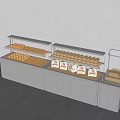 Display Cabinets With Glass Cover For Bread And Pastries On Metal Countertop