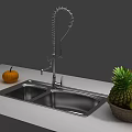 Stainless Steel Double Bowl Kitchen Sink With Pull Down Faucet And Fresh Fruits On Countertop