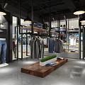 Modern Clothing Store Interior With Clothes On Hangers Wooden Display Table And Green Plants