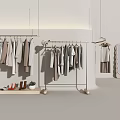 Modern Clothes Rack In Clothing Store Interior With Hanging Clothes Mirror And Shoes