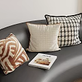 Stylish Decorative Pillows With Various Patterns On Black Sofa And Home Magazine