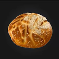 Freshly Baked Round Bread With Golden Brown Crust And Sesame Seeds