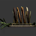 Assorted Colored Bread Slices Displayed on Wooden Tray With Green Leaf Accents