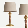Modern Table Lamps With Beige Lampshades Gold Bases And Marble Textured Columns