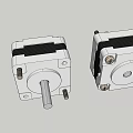 White Stepper Motors With Black Components And Metal Shafts For Industrial Use
