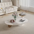 Modern Living Room Coffee Table With White Top Wooden Legs Vase Pink Flowers And Books