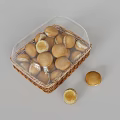 Fresh Small Round Pastries in Transparent Plastic Container and Wicker Basket with Separate Pieces