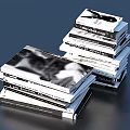 Stacks Of Books Magazines Featuring Black White Covers With Text And