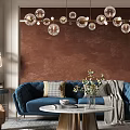 Modern Living Room With Blue Sofa Spherical Chandelier Beige Armchair And Coffee Table
