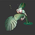 Vibrant Green Decorative Ornament With Large Tropical Leaves And Small Figure On Round Base