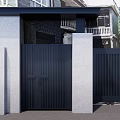 Modern Black Slatted Entrance Gate With Gray Pillars And Mountain View Greenery