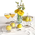 Fresh Lemon Flavored Drinks And Ice Cream With Decorative Flowers In Glassware
