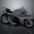 Sleek Silver Motorcycle With Modern Streamlined Design Black Seat And Alloy Wheels