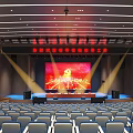 Large Conference Hall Interior With Stage Large Screen Party Emblem Red Background And Arranged Seats
