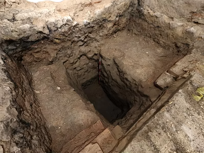 Archaeological Excavation Site Featuring Square Ancient Pit With Soil Layers And Stone Edges 3d model