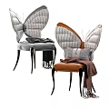 Modern Butterfly Shaped Dining Chairs With Gray Brown Upholstery And Decorative Throw Blankets