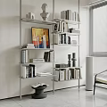 Modern Open Shelf Bookshelf With Stacked Books Framed Art And Decorative Sculptures