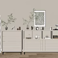 Modern White Console Cabinet And Sideboard With Vases Green Plants Decorative Painting On Light Brown Wall
