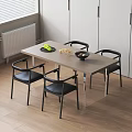 Modern Dining Table Set with Black Chairs Light Wood Top Fruit Bowl and Snacks