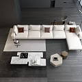 Modern Living Room Interior With White Multi Seater Sofa Brown Cushions Coffee Table And Bookshelf
