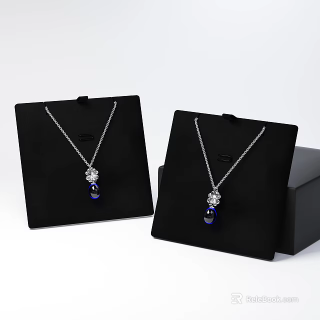 Elegant Silver Necklaces With Blue Gemstone And Diamond Accents On Black Display Stands 3d model 