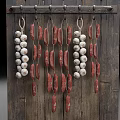 Traditional Hanging Food Storage With Sausages And Garlic Bulbs On Wooden Board