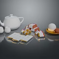 Household Items Collection Featuring White Teapot Cups Tea Bags And Eggs On Plate