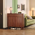 Wooden Shoe Cabinet in Living Room with Green Sofa Decorative Paintings Table Lamp and Shoes