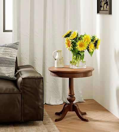 Round Side Table With Glass Vase Of Sunflowers Next To Brown Sofa And White Curtain 3d model
