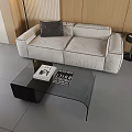 Light Sofa And Glass Top Coffee Table Set With Dark Pillow In Modern Living Room