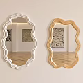 White and Gold Scalloped Edge Mirrors Hanging on Wall with Abstract Paintings and Wooden Floor