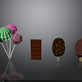 Assorted Colorful Desserts Display Featuring Lollipops Chocolate Bar And Chocolate Strawberry Ice Cream