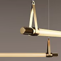 Modern Minimalist Brass Pendant Light With Sleek Suspended Design And Warm Yellow Glow