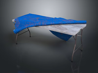 Patterned Blue Fabric Draped Over Metal Frame Table With Gray Top Surface 3d model