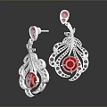 Elegant Silver Earrings With Red Gemstones And Decorative Metal Design